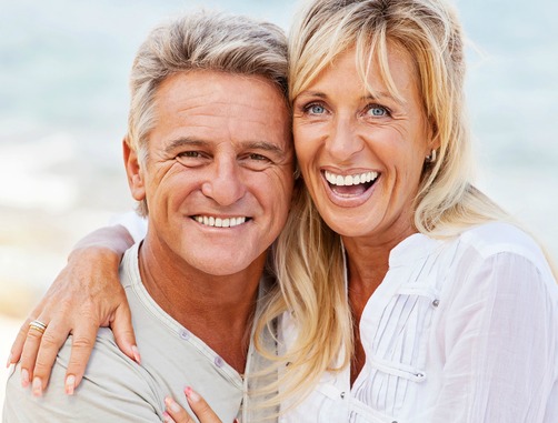 couple smiling after receiving platelet-rich-plasma treatment