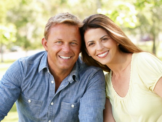 couple smiling after receiving oral pathology in richmond indiana