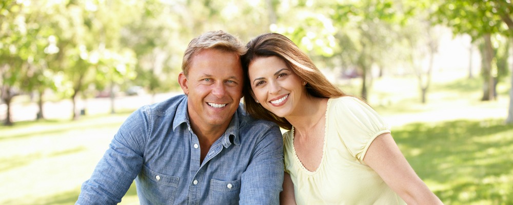 couple smiling after receiving oral pathology in richmond indiana