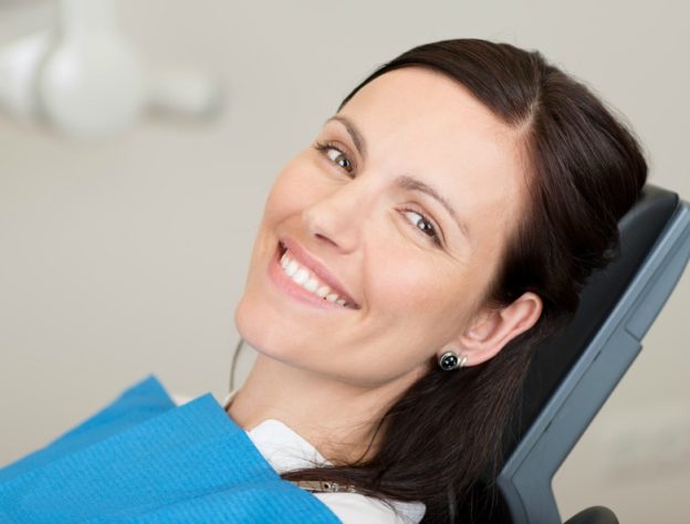 woman smiling while waiting for wisdom teeth removal in richmond indiana